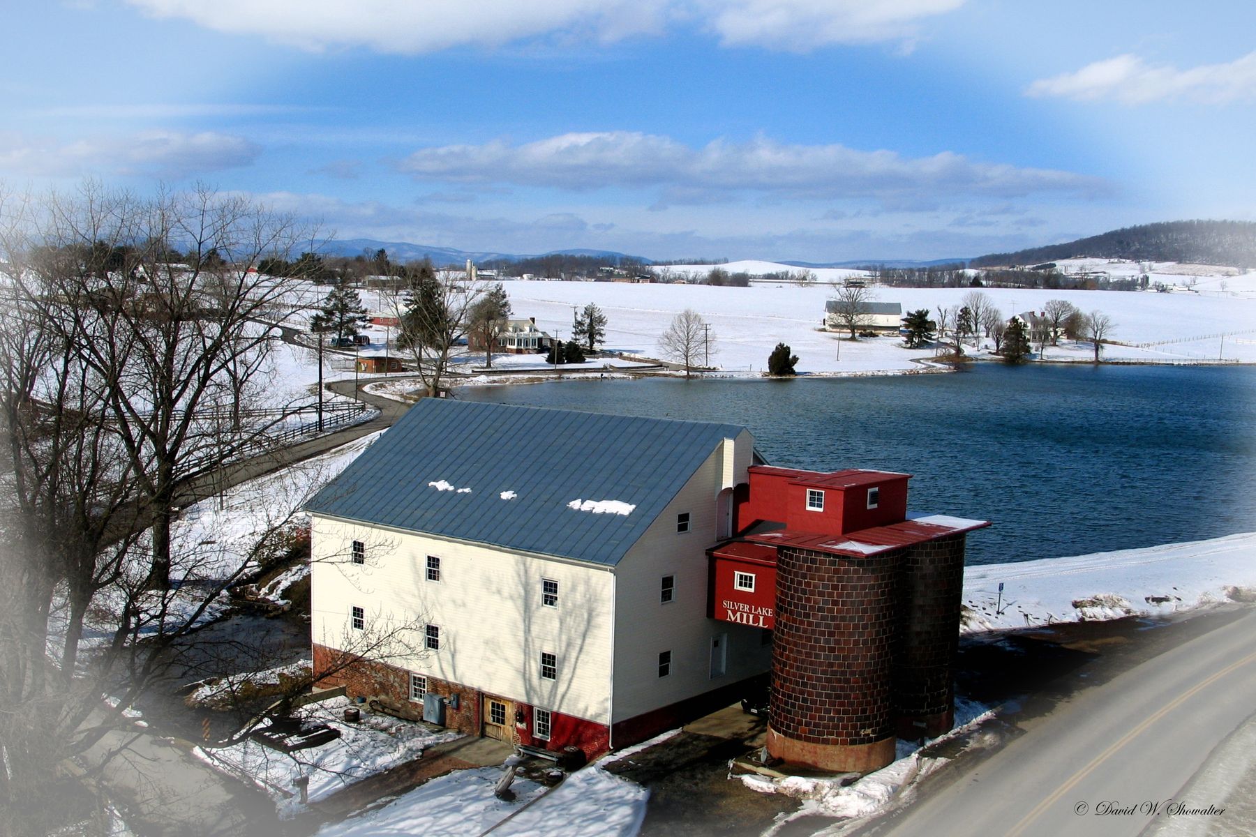 Aerial view of Silver Lake Mill and the mill pond in winter